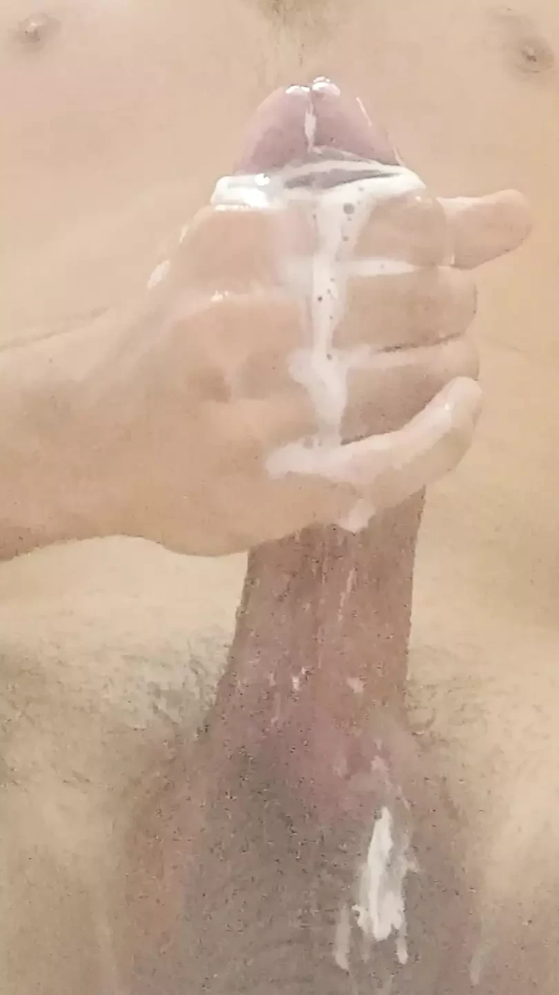 hotie boy uses soap on his big cock and big balls stroking his full length and having big orgasm