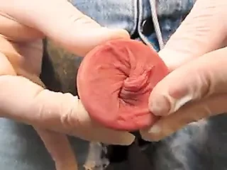 Glass tunnel to the outside of the foreskin.