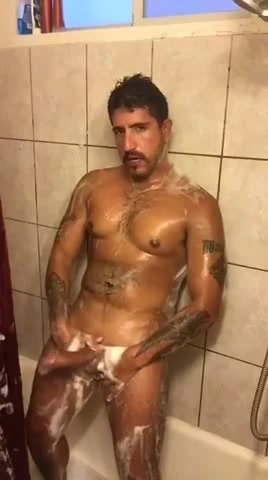A muscle gay in the shower