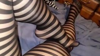 Wife shows off in striped pantyhose