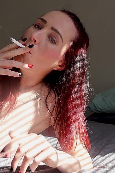 Nude Smoking on the Bed
