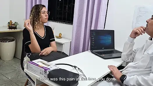 Medical examination of the patient's abdomen in the doctor's office.