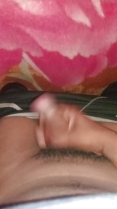 Masturbating