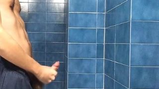 Big cum explosion against the bathroom wall. Lots of sperm