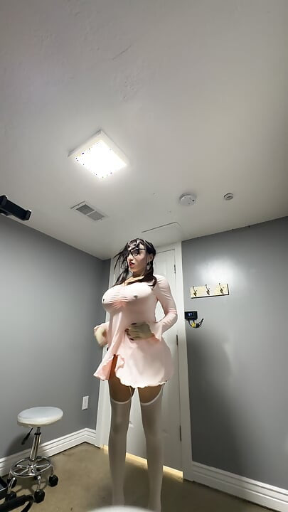 Hot trans wearing her sexy pink dress teasing huge tits