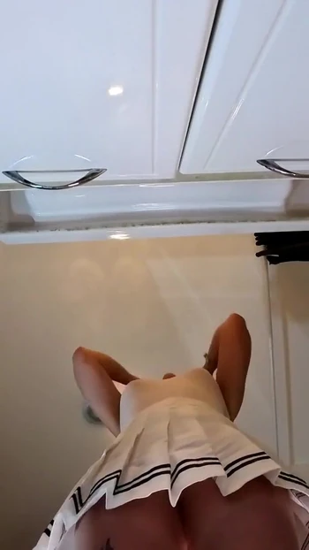 Iconic moment from "Super hot petite blonde cheerleader  a short miniskirt and a see through top to show her tits flash"