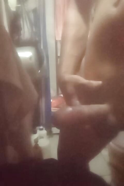 Cock plucking in the toilet