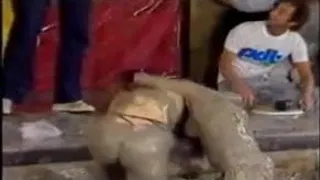 CLOTHED Mudwrestling British Chicks wrestle in mud