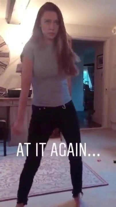 Pretty brunette with big bouncing boobs, dancing clip