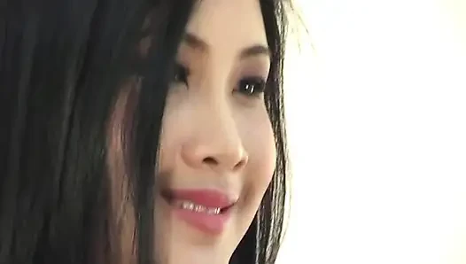 Wedding asian makes herself a cake