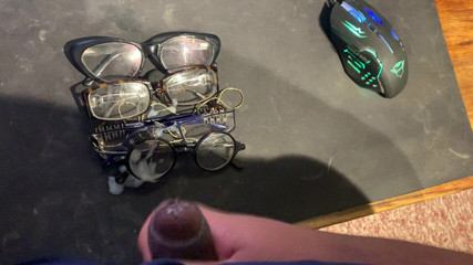 Cumshot on multiple glasses.