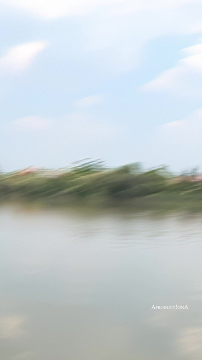Bettina by the river