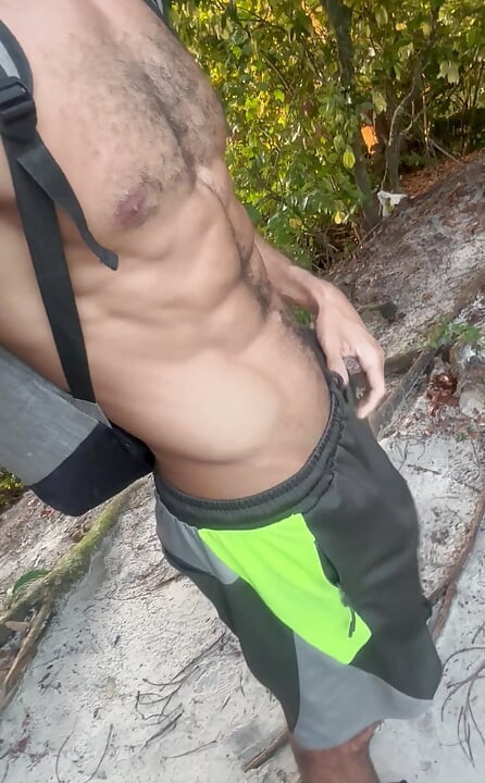 Hairy dad with a huge dick showing off on the trail