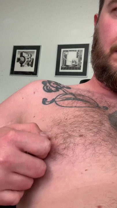 Tattooed hairy bear with huge nipples
