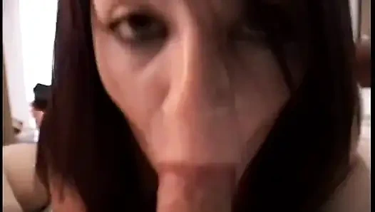 Camera man films a cute brunette slut with tattoo sucking on his hard cock