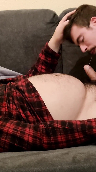 Sucking off a Hairy Bear on the Sofa