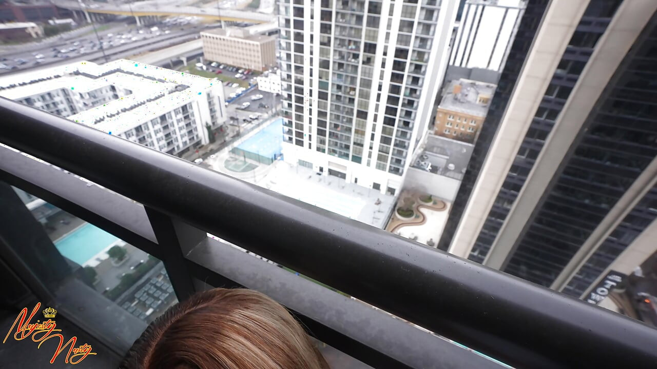 Ebony sucks BBC on balcony