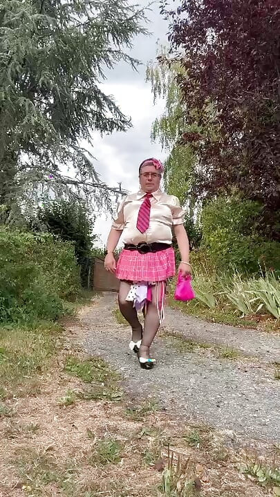 Dressed in a pink plaid mini skirt for a night out