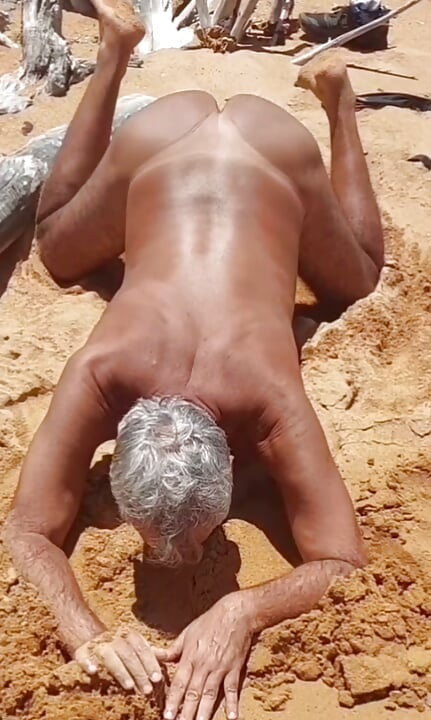Ladysilva on all fours wanting cock in her hot ass on the beach