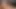 Altın elbiseli Hotkinkyjo çift kafa dildo kullanarak amıyla ve götüyle oynuyor