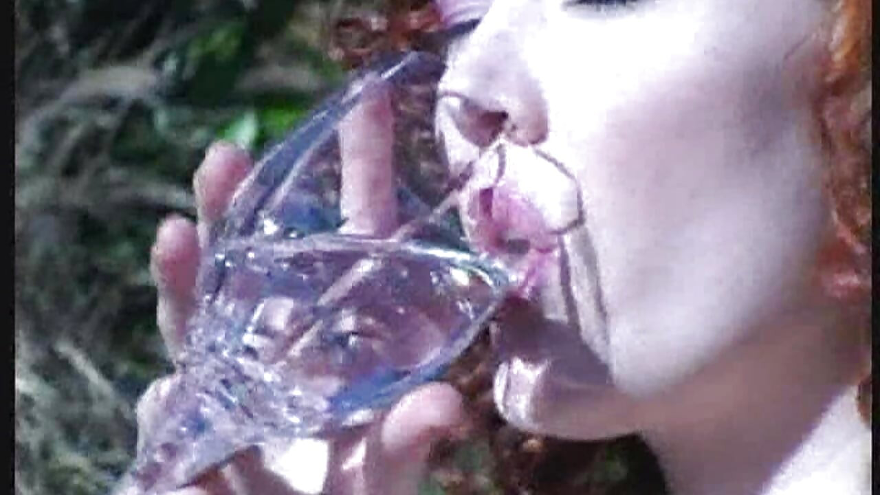 Mature Blonde MILF Drenches Glass with Golden Stream Outdoors