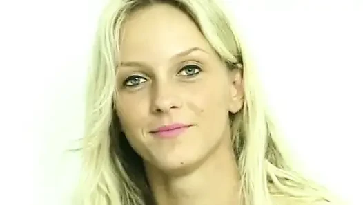 Sexy blonde babe is filling her snatch with a huge dildo