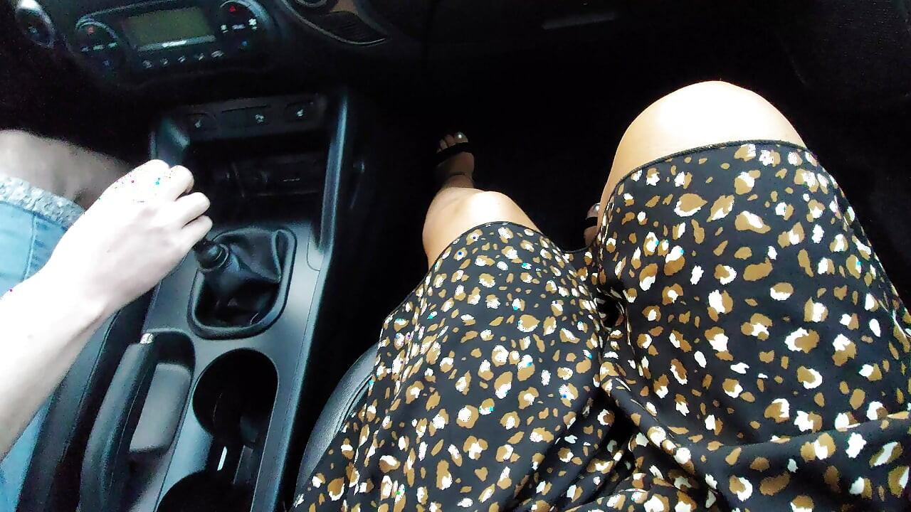 Elegant MILF with sexy legs in heels and a short skirt seduces her driver