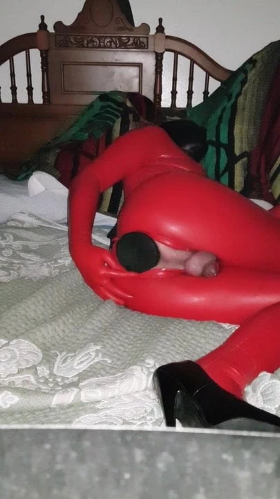 Like a rubberdoll in chastity, huge plug and heels