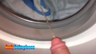 Andy pees in a washing machine