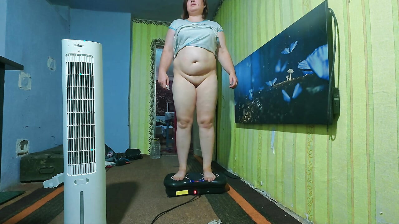 Full Body Big Tits Babe on Scale & Vibrating Platform Inserts Butt Plug