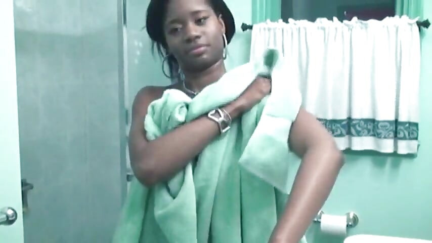 Leggy black chick with big breasts gets wet and soapy in shower at hotel