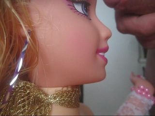 Кукла и камшот на лицо