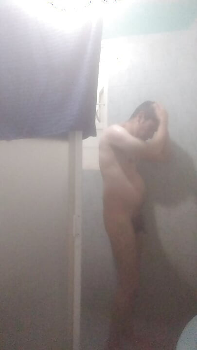Naked man in shower
