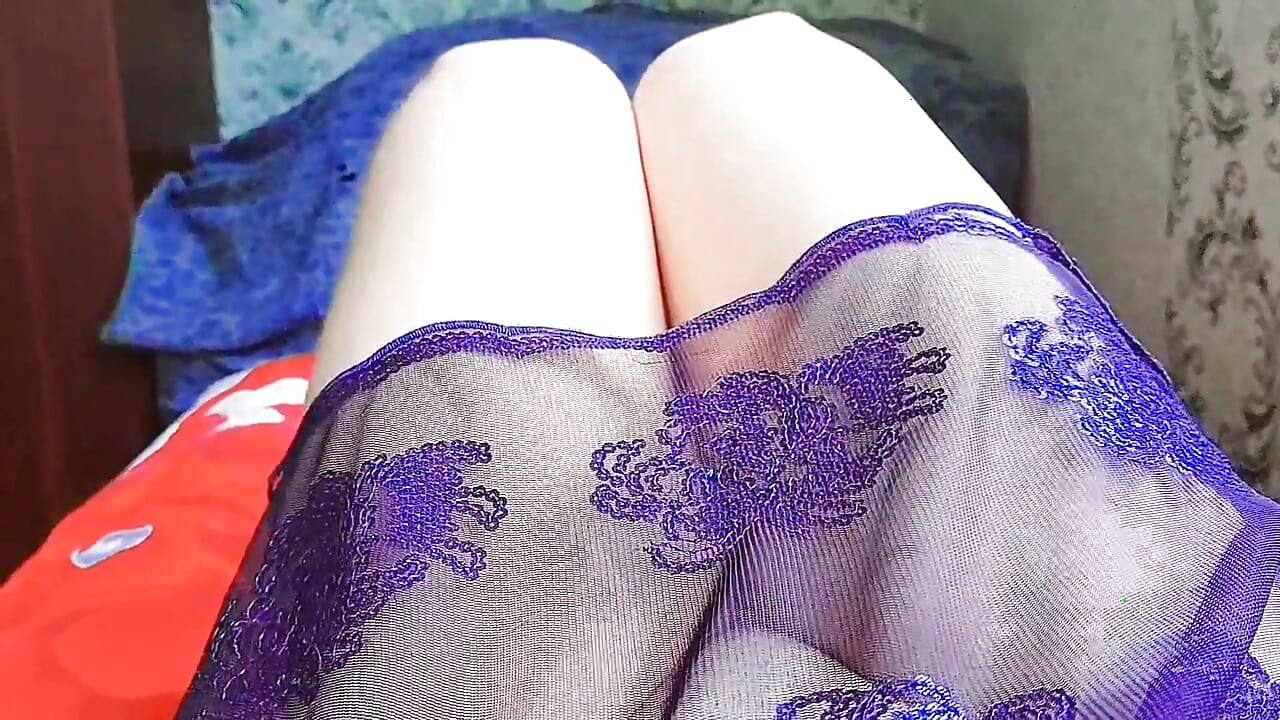 Lovely sissy lying sideways with playful hair twirl