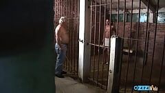 Секс-рабыня в клетке сосет досуха член старого толстого мужика