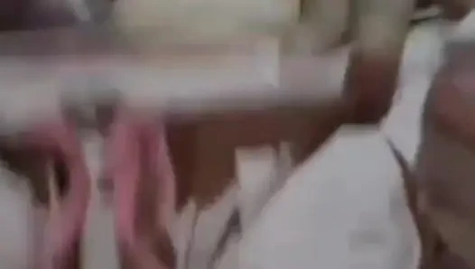 Alone in the house, a woman is calming her pussy with eggplant