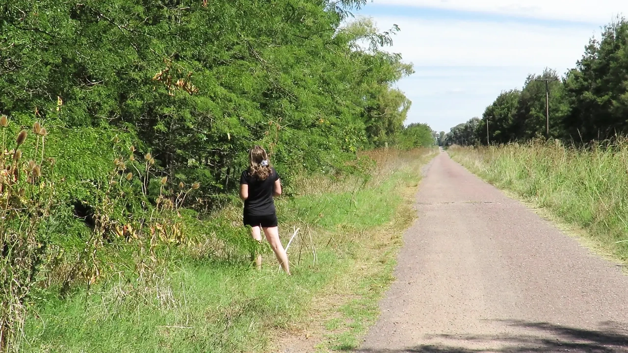 Patricia undresses under the summer sun