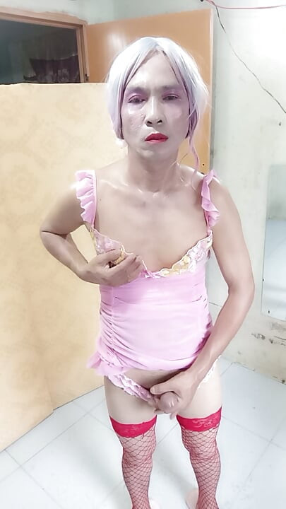 Oanh Le transgender wearing sexy and pornographic clothes standing and screaming is extremely happy