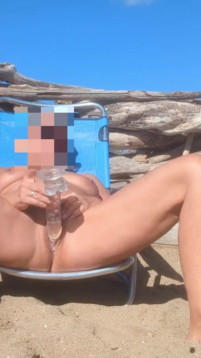 Beach in Cap d'Agde - She dildos her pussy in front of strangers - Exhibition | Clip 1