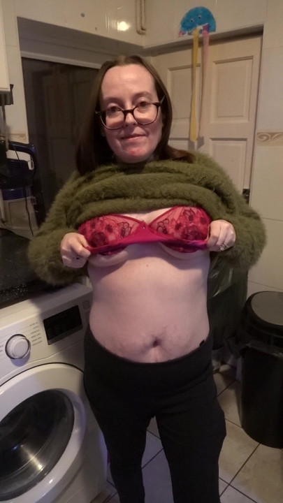 wife showing off breasts