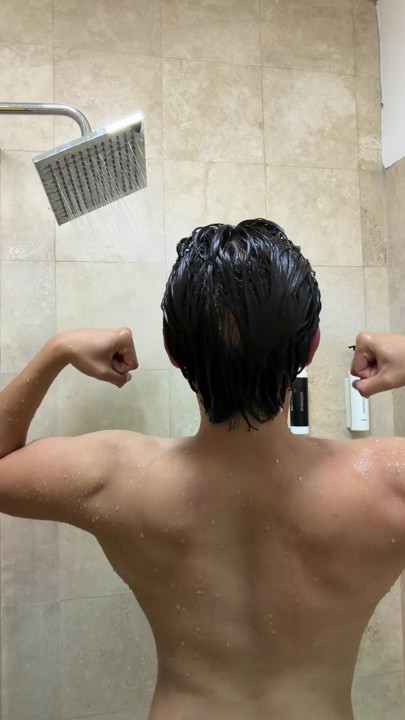Flexing my muscles in the showers | Clip 1