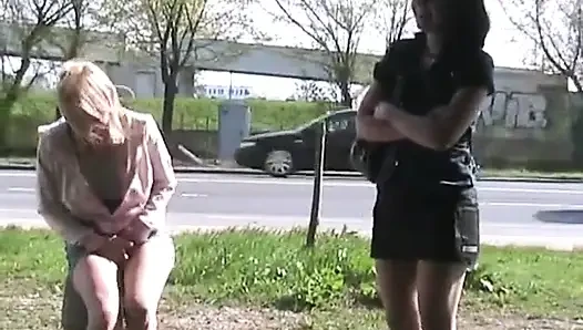 Pissing on a parking lot
