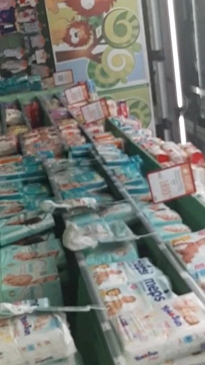 Cute girl walks the hypermarket with a phat ass 4