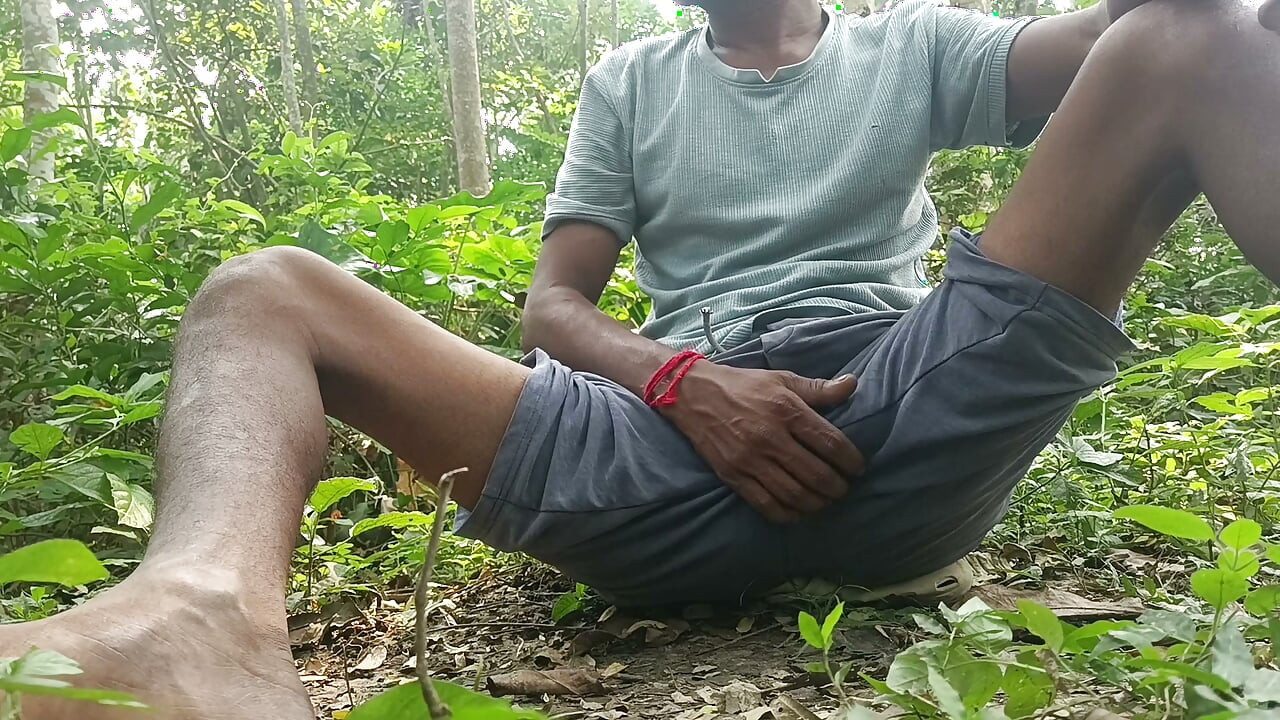 Indian mature masterbating in forest.