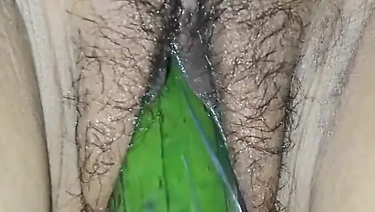 Indian desi sister-in-law with cucumber
