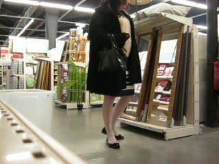 crossdresser ajusting her stockings