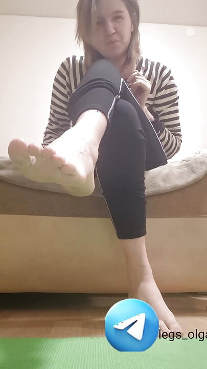 The girl makes you lick your feet and shoes. Sweet femdom