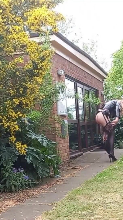Emotional moment from "Crossdressing Gina Cumming in Panties Outdoors"