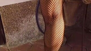 A sexy German lady gets fucked hard over her black fishnets