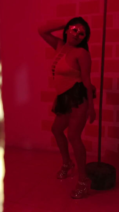 The nightclub has a very sensual Colombian visiting her! She dances beautifully with a customer. | Clip 1